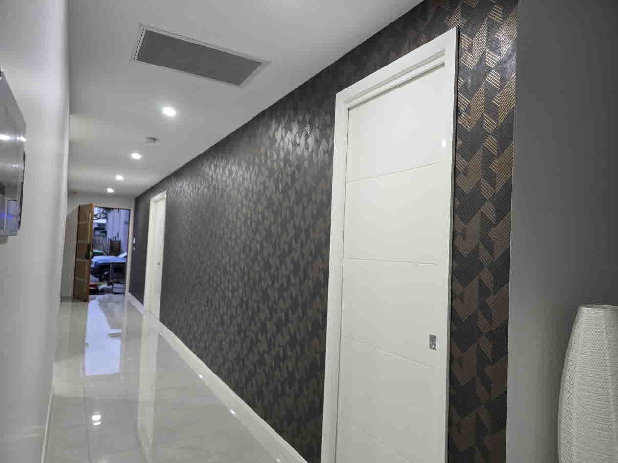 Entry hallway wallpaper feature wall installed by Wallpaper Masters Sydney